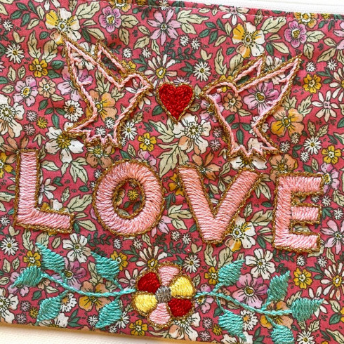 LOVE embroidered clutch M
